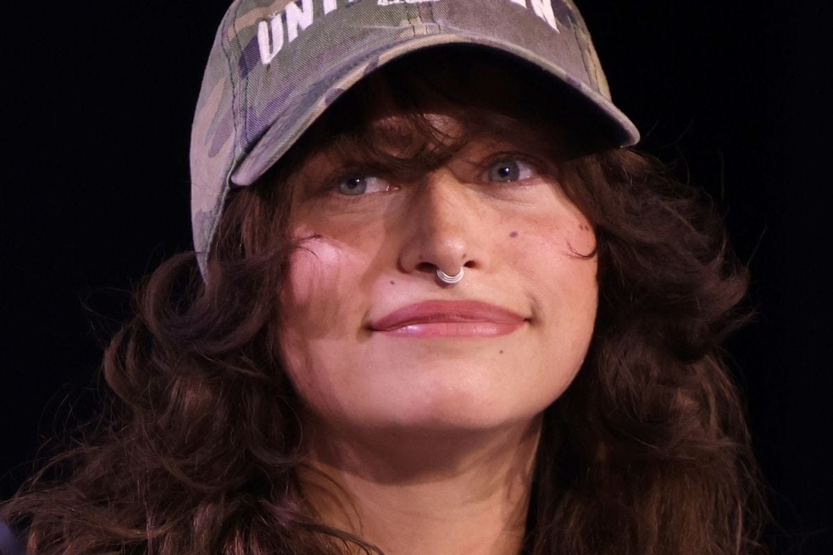 Odessa A'zion speaking at an event in Anaheim, California.