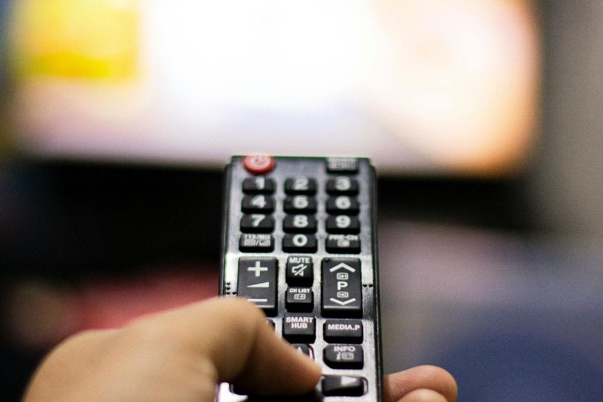 Weekend Streaming Picks: The Shows Everyone Will Be Talking About 3 Remote pointing at TV. / weekend streaming picks