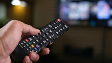 Tv Remote And Tv. / Roku