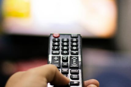 Remote Pointing At Tv. / Weekend Streaming Picks