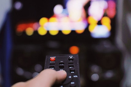 Pointing Remote At Tv